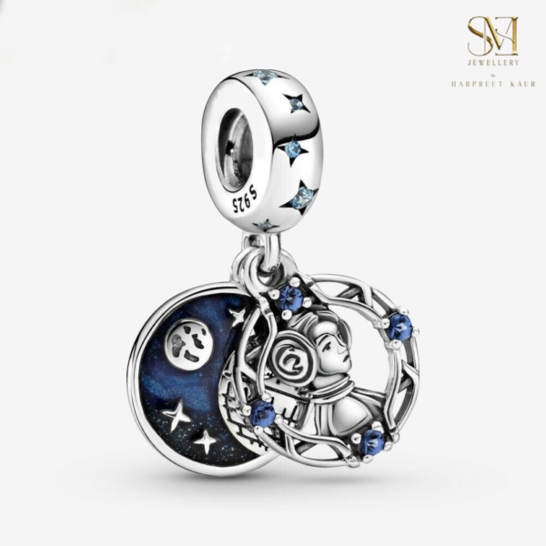 Explore the wonders of the cosmos with our exquisite Astronaut Charm, crafted in sterling silver and adorned with sparkling blue stones—a perfect piece for dreamers and stargazers alike. - Image 2