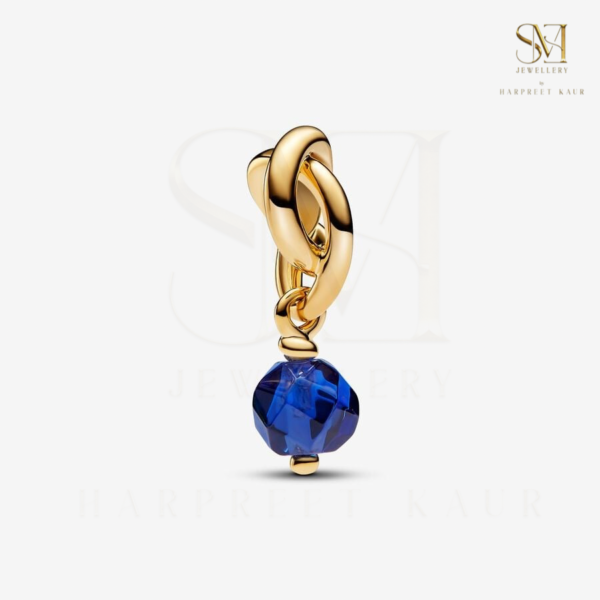 Celebrate September with our Birthstone Eternity Circle Dangle Charm, featuring the deep blue of sapphire for wisdom and elegance.”